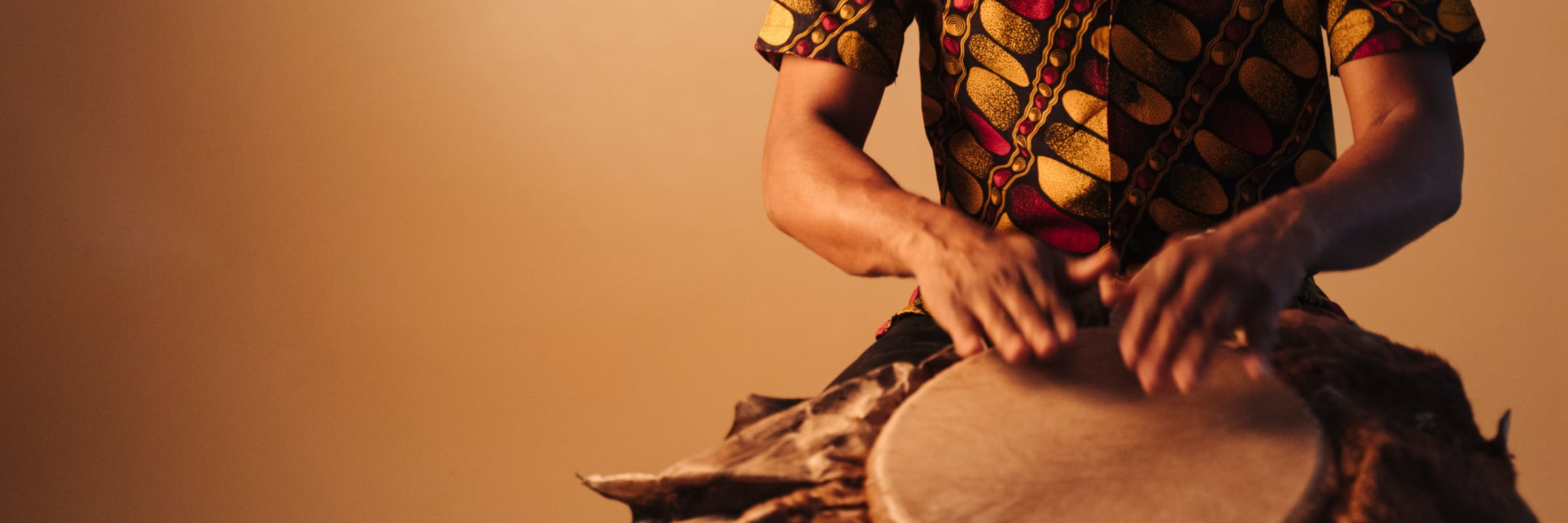 Musician playing a djembe